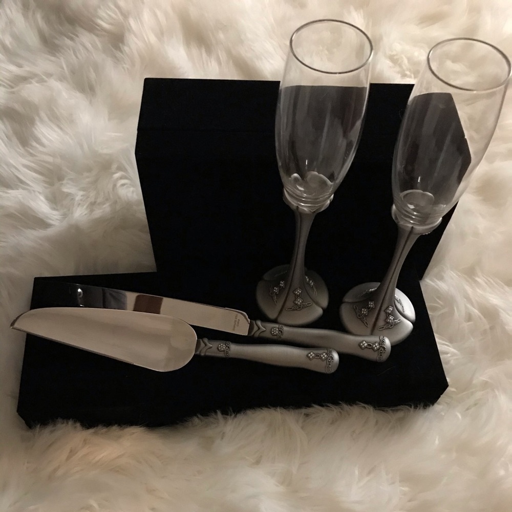 Wedding toasting flutes and cake server set.